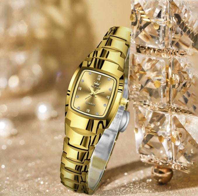 A lady's watch in gold plated bracelet.