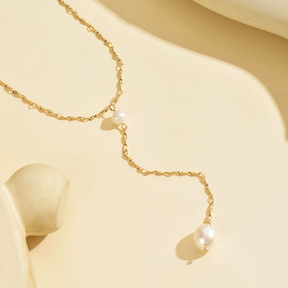 Elegant Gold-Tone Pearl Drop Necklace