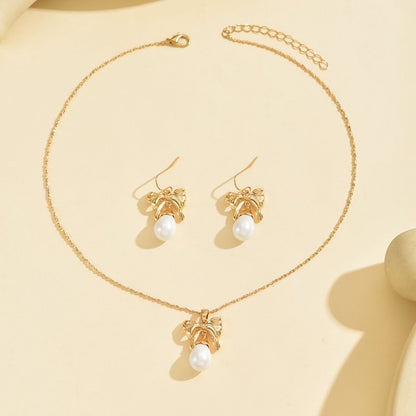 Elegant Gold-Toned Bow & Pearl  Jewelry Set - Necklace & Earrings